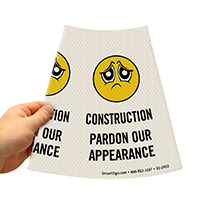 Pardon Our Appearance sign