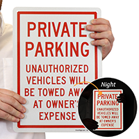 Unauthorized Vehicles Towed Sign